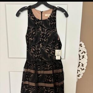 Black and tan lace knee length dress